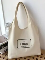 Túi liền thân có túi phụ in logo theo yêu cầu
